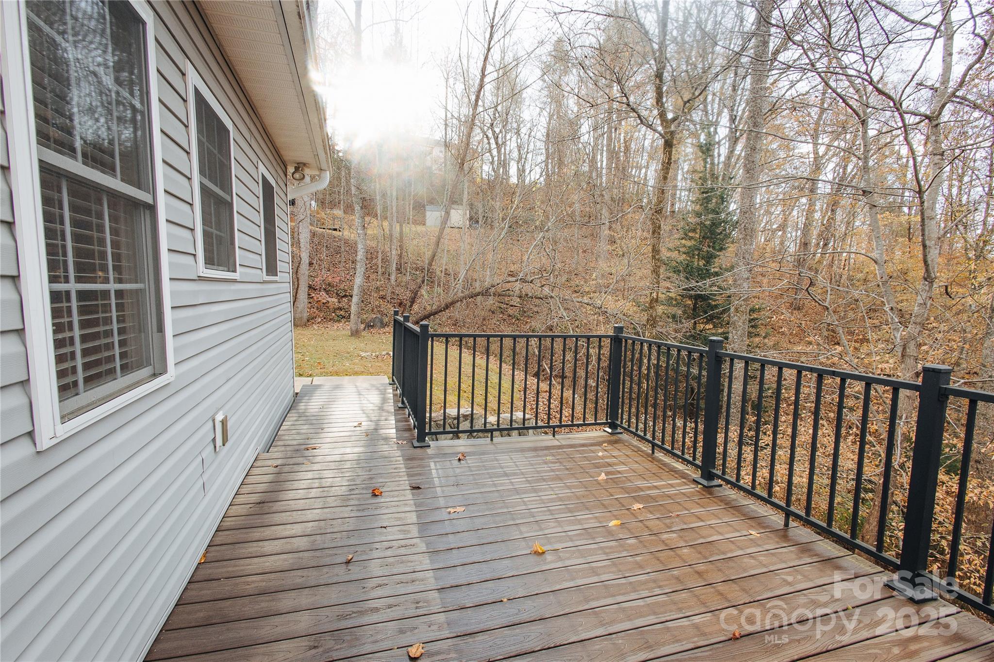 89 Bobcat Path Marion, NC 28752 - Photo 24 of 48 a view of balcony with wooden floor and fence