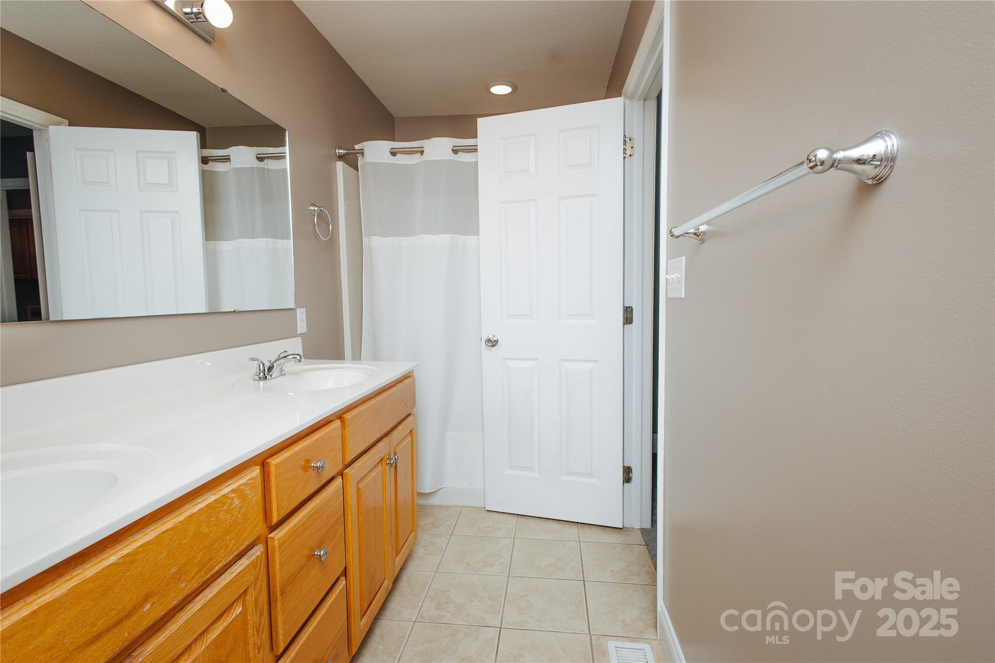 89 Bobcat Path Marion, NC 28752 - Photo 33 of 48 a bathroom with a sink mirror and a shower