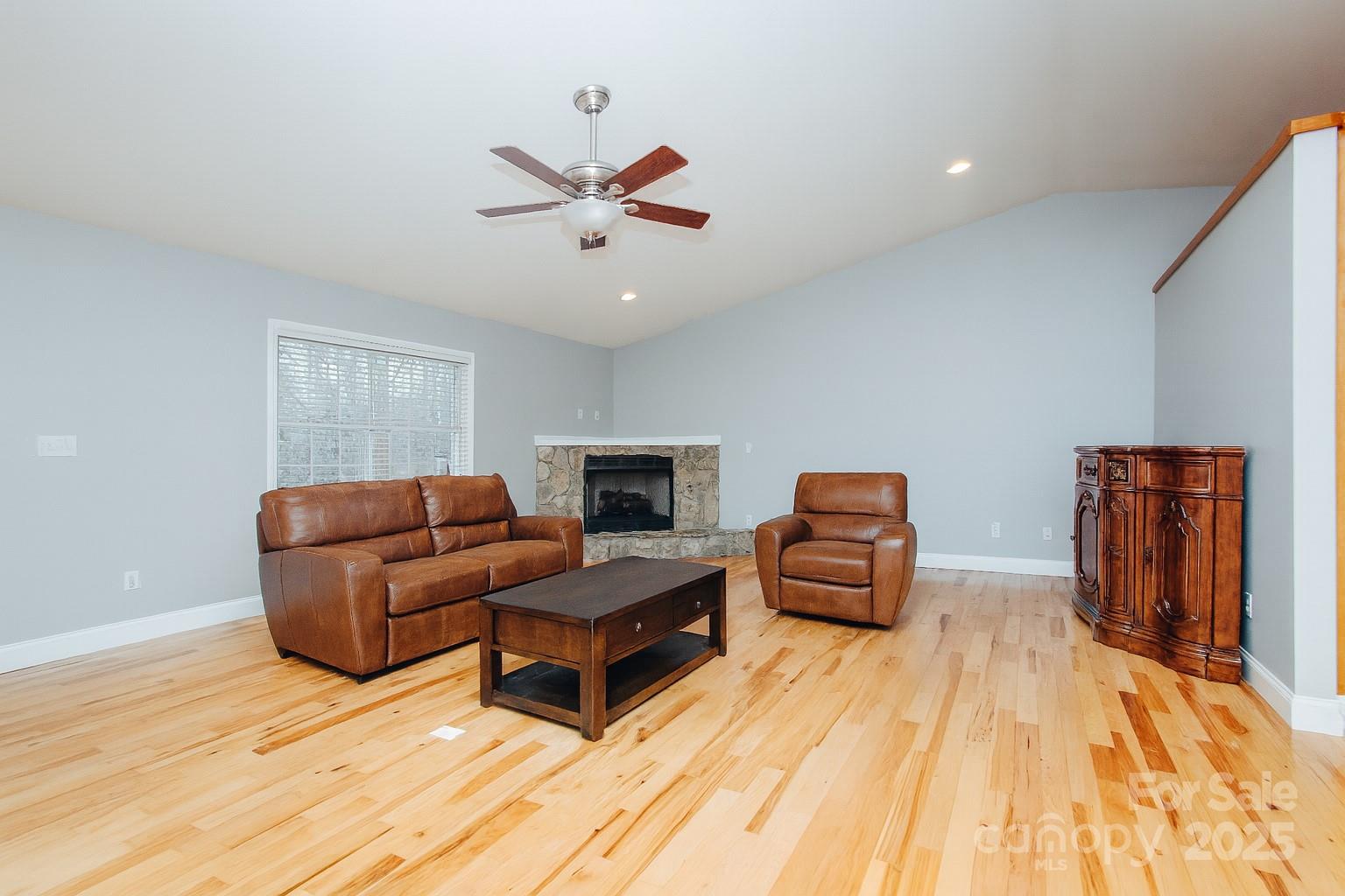 89 Bobcat Path Marion, NC 28752 - Photo 45 of 48 a living room with furniture and a wooden floor
