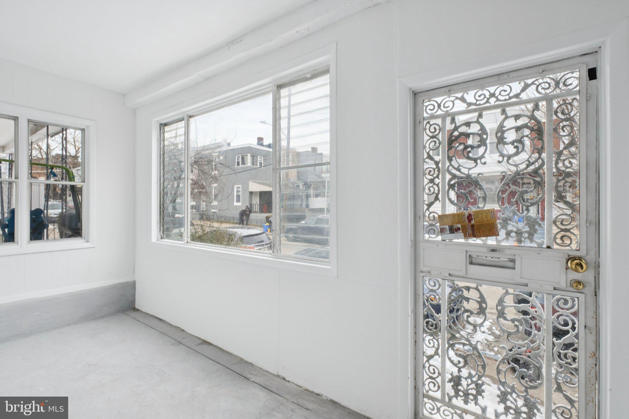 6638 Ross Street Philadelphia, PA 19119 - Photo 4 of 18 a view of empty room with window