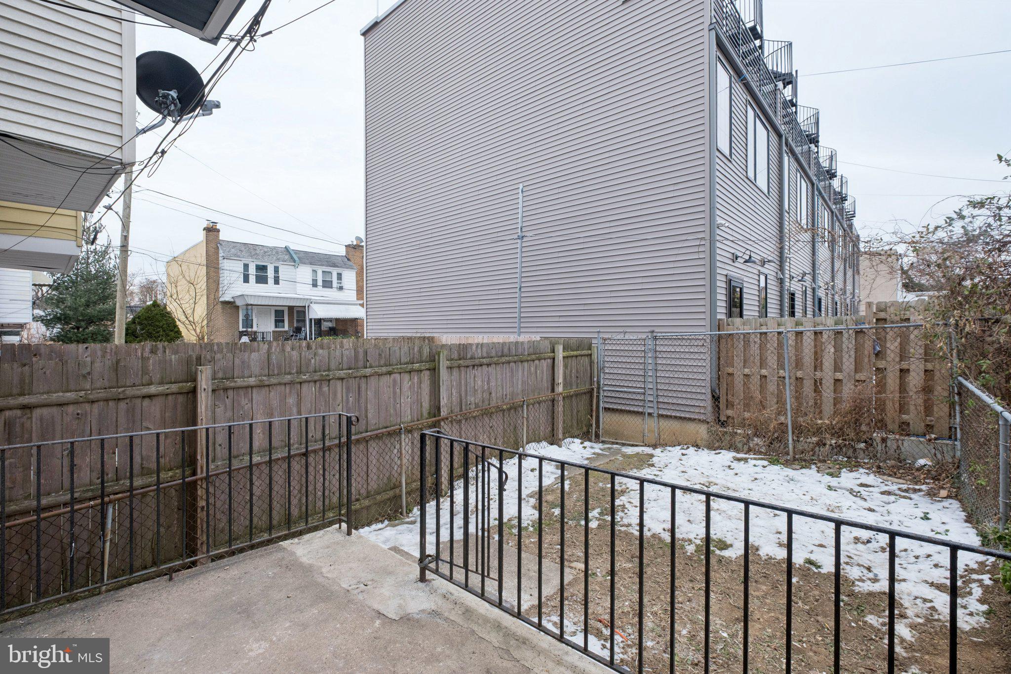 6638 Ross Street Philadelphia, PA 19119 - Photo 10 of 18 a view of a brick building from the roof