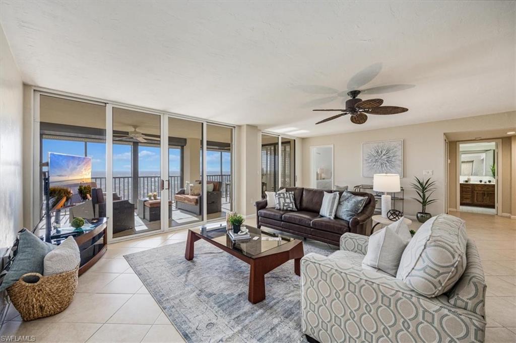5601 Turtle Bay Drive, Unit 2003 Naples, FL 34108 - Photo 3 of 19 a living room with furniture