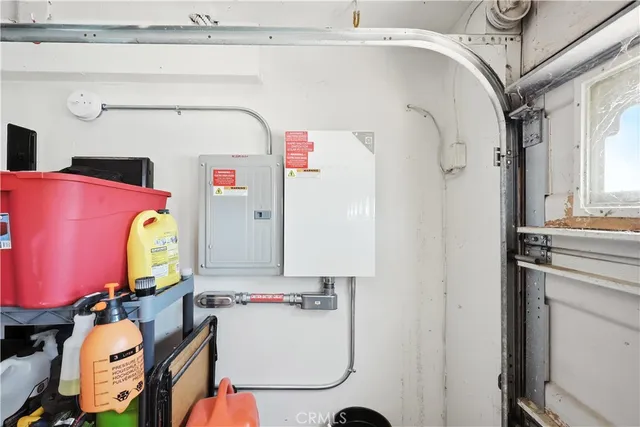 a room with furniture a washer and dryer