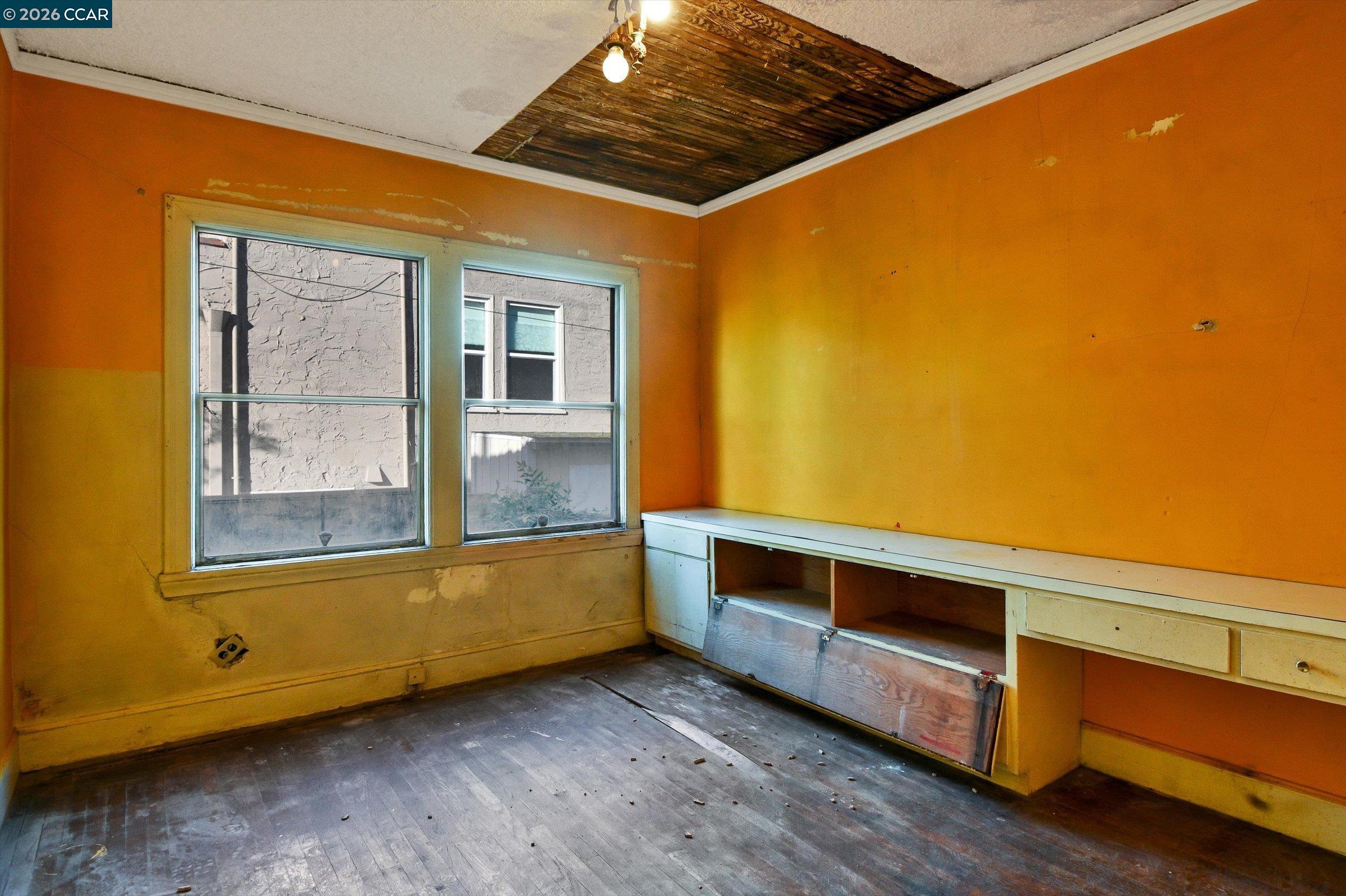 1711 Carleton Street Berkeley, CA 94703 - Photo 15 of 40 a view of an empty room with a window
