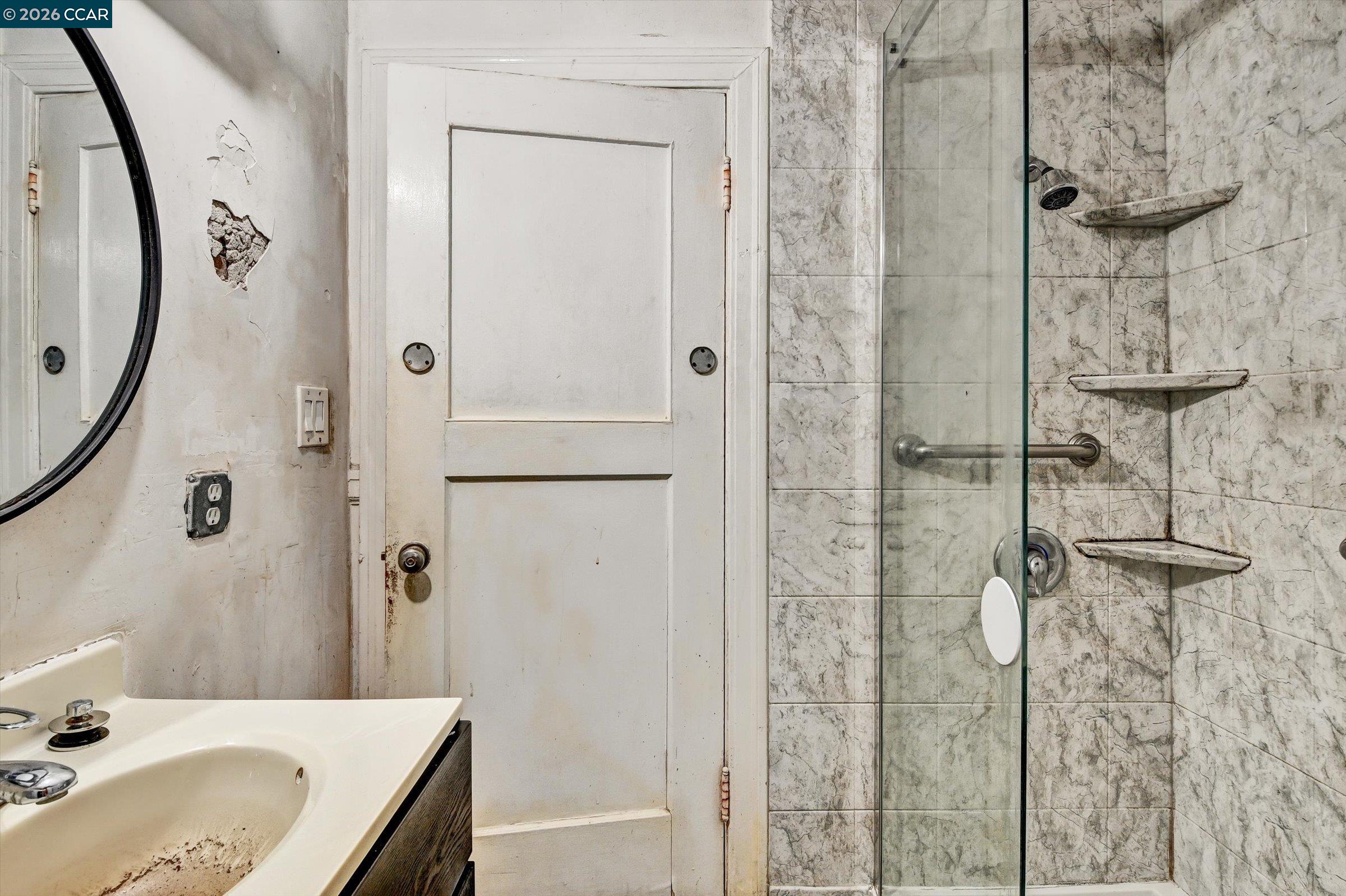 1711 Carleton Street Berkeley, CA 94703 - Photo 18 of 40 a bathroom with a tub sink and shower