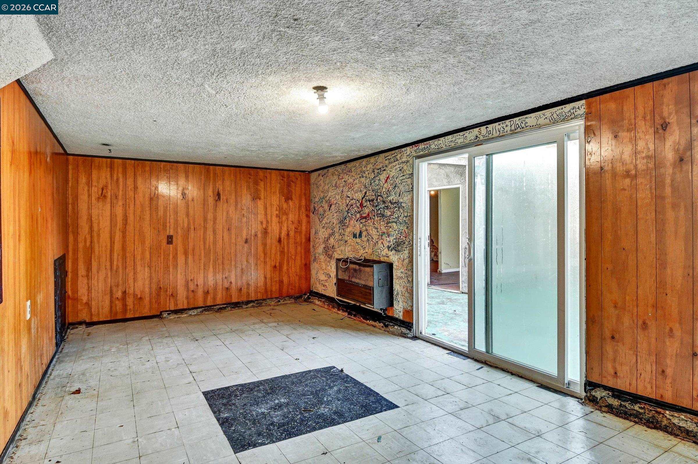 1711 Carleton Street Berkeley, CA 94703 - Photo 26 of 40 a view of an empty room with a fireplace