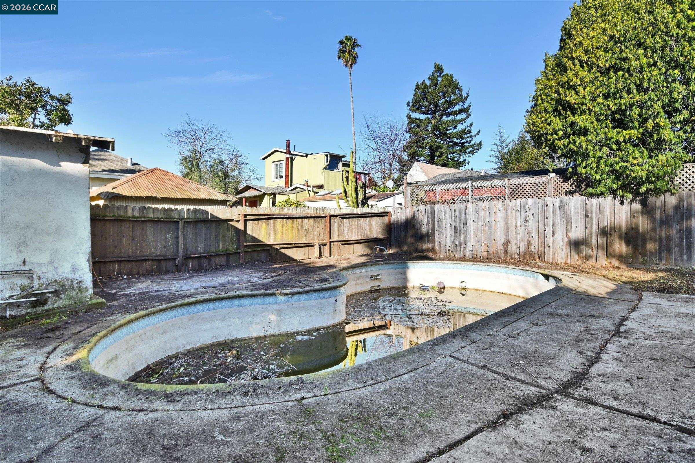 1711 Carleton Street Berkeley, CA 94703 - Photo 34 of 40 a view of a swimming pool with a patio