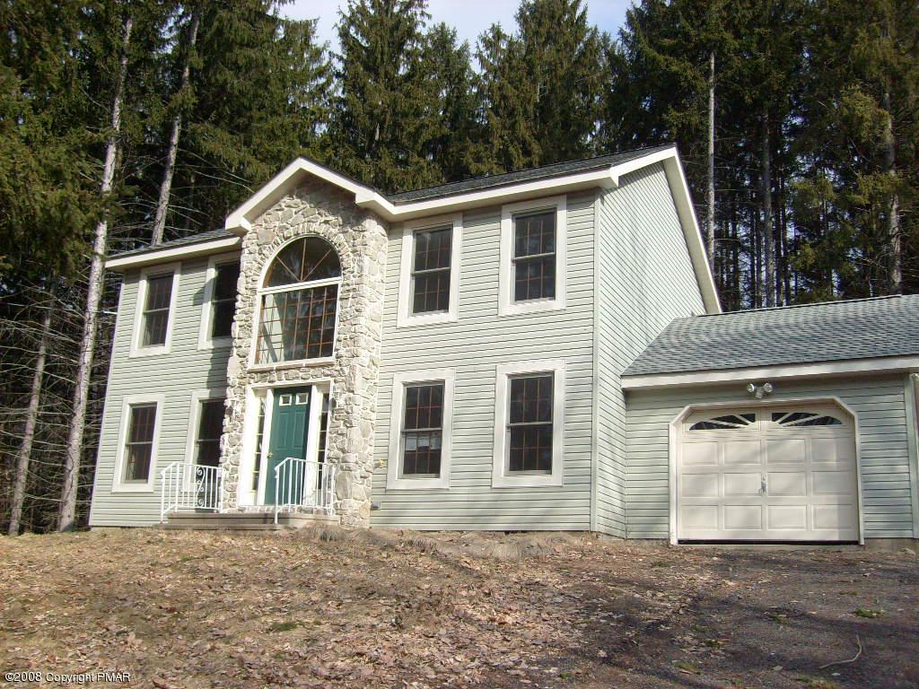 8164 A Rinker Road Stroudsburg, PA 18360 - Photo 1 of 1 a front view of a house with a yard