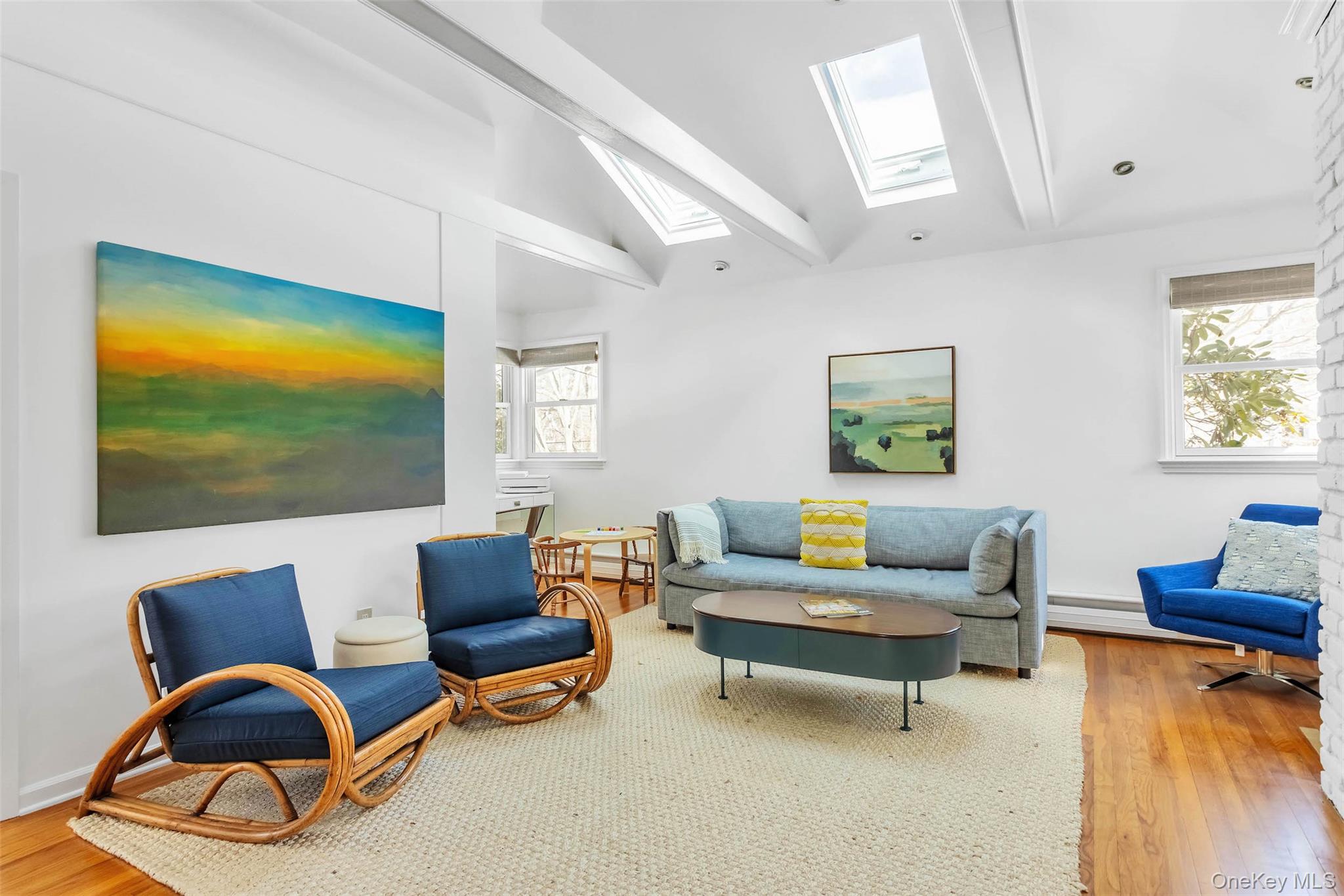 485 Pine Road Southold, NY 11971 - Photo 11 of 39 a living room with furniture a flat screen tv and rug floor