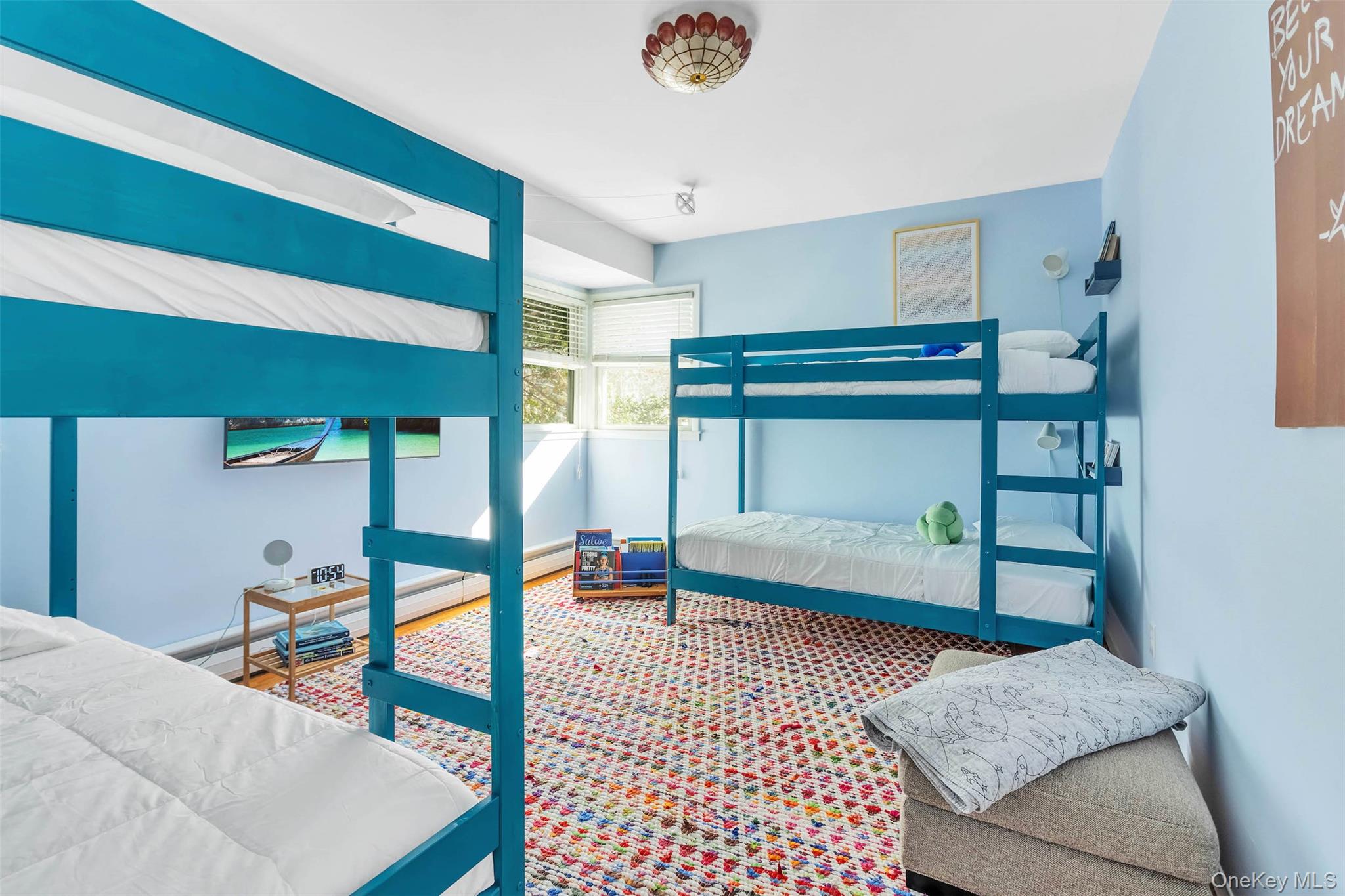 485 Pine Road Southold, NY 11971 - Photo 23 of 39 a bedroom with furniture and a rug