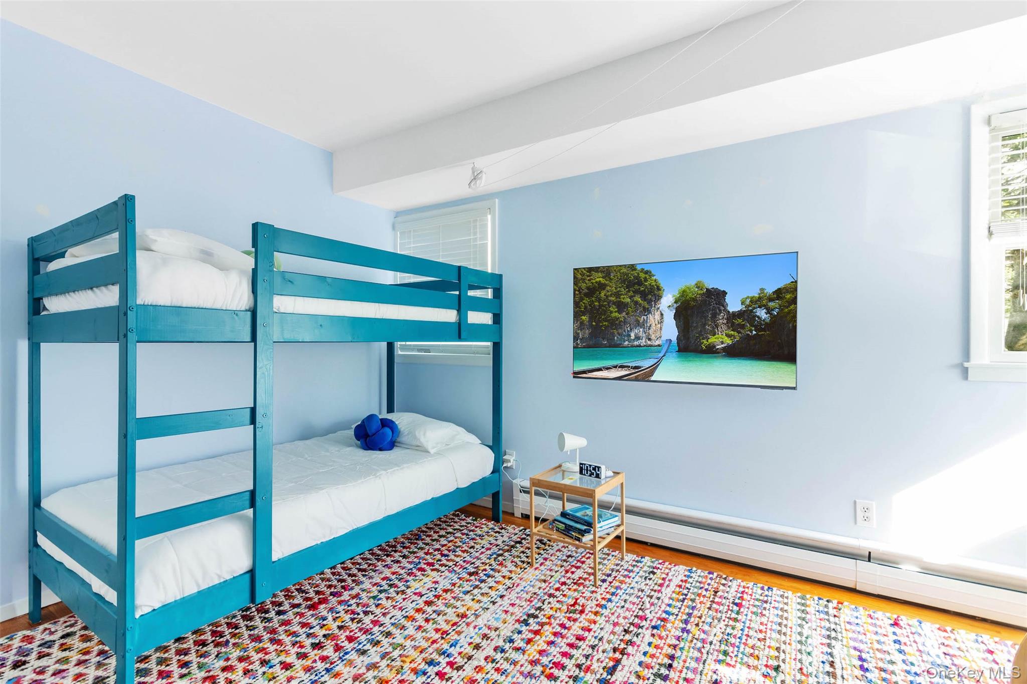 485 Pine Road Southold, NY 11971 - Photo 24 of 39 a bedroom with furniture and a window