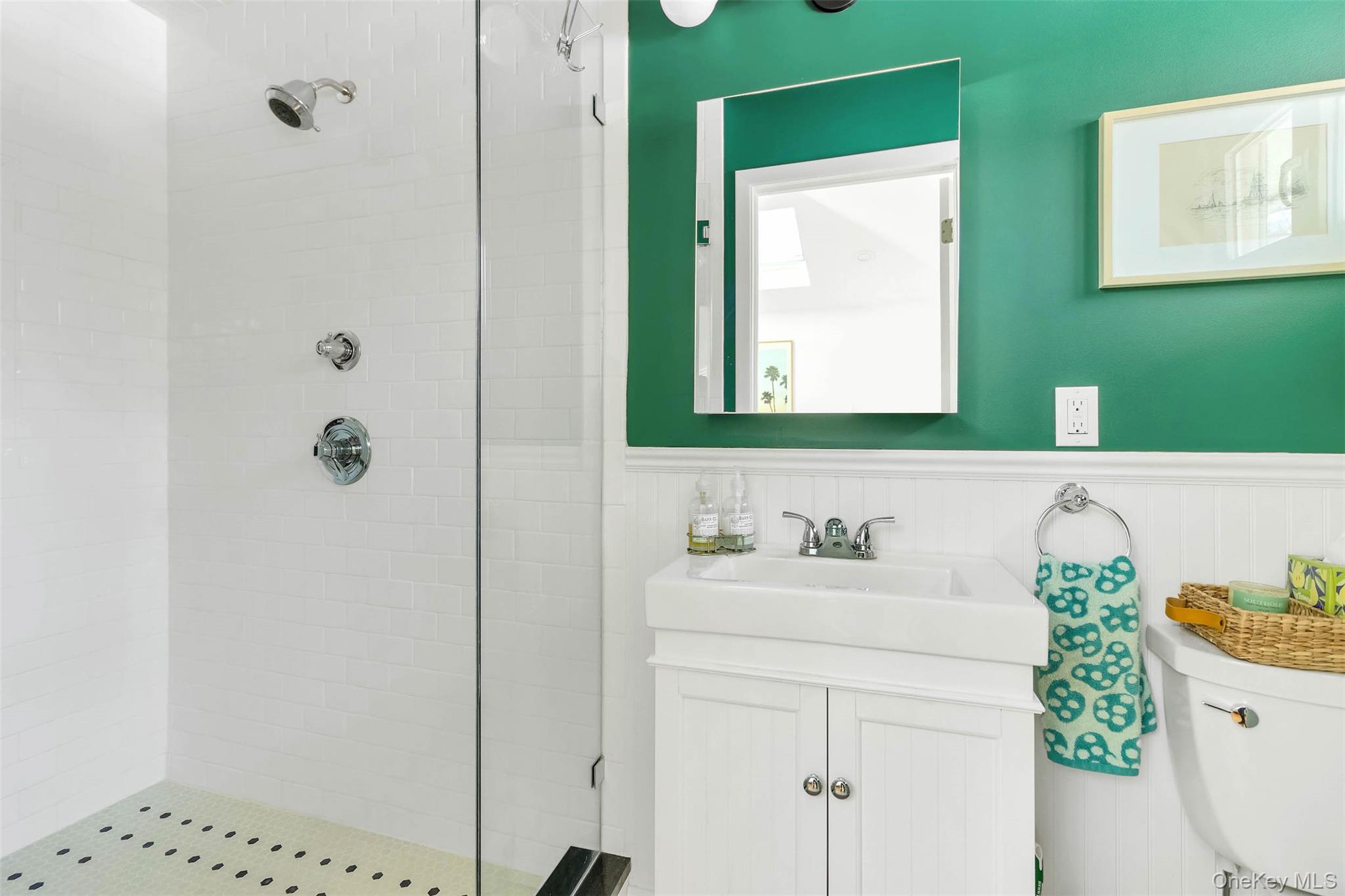 485 Pine Road Southold, NY 11971 - Photo 29 of 39 a bathroom with a sink a toilet and shower