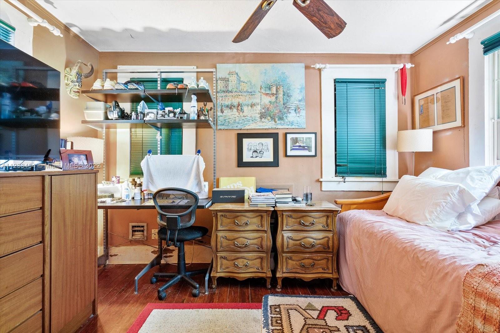 3041 Oak Avenue Coconut Grove, FL 33133 - Photo 15 of 31 a living room with furniture and a flat screen tv