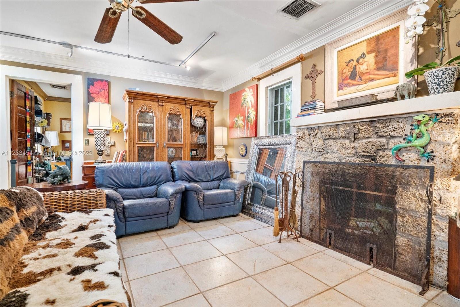 3041 Oak Avenue Coconut Grove, FL 33133 - Photo 6 of 31 a living room with furniture and a fireplace