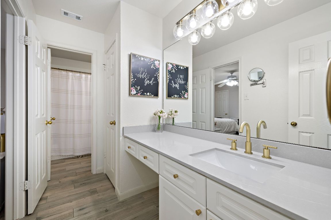 1237 Fall Creek Loop Cedar Park, TX 78613 - Photo 30 of 36 Full upstairs bath includes 2 separate vanity areas for added utility