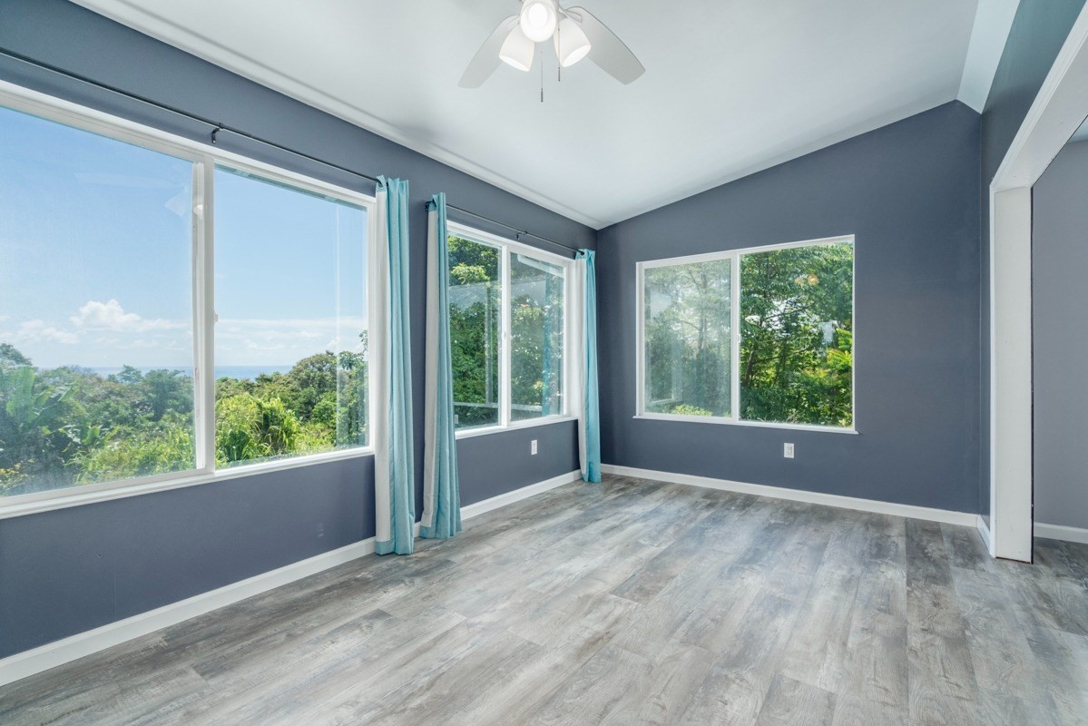 27-571 Kalaoa Camp Road Papaikou, HI 96781 - Photo 22 of 29 a view of an empty room with a window
