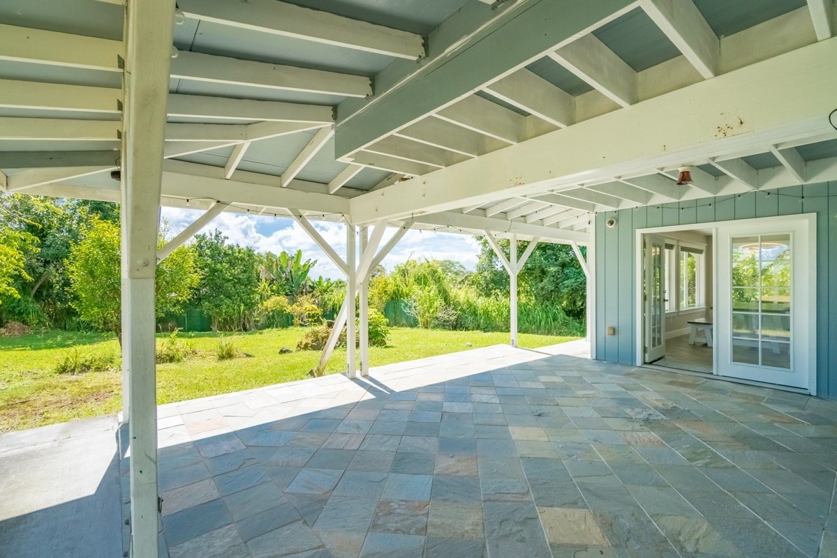 27-571 Kalaoa Camp Road Papaikou, HI 96781 - Photo 10 of 29 a view of an empty room with a large window