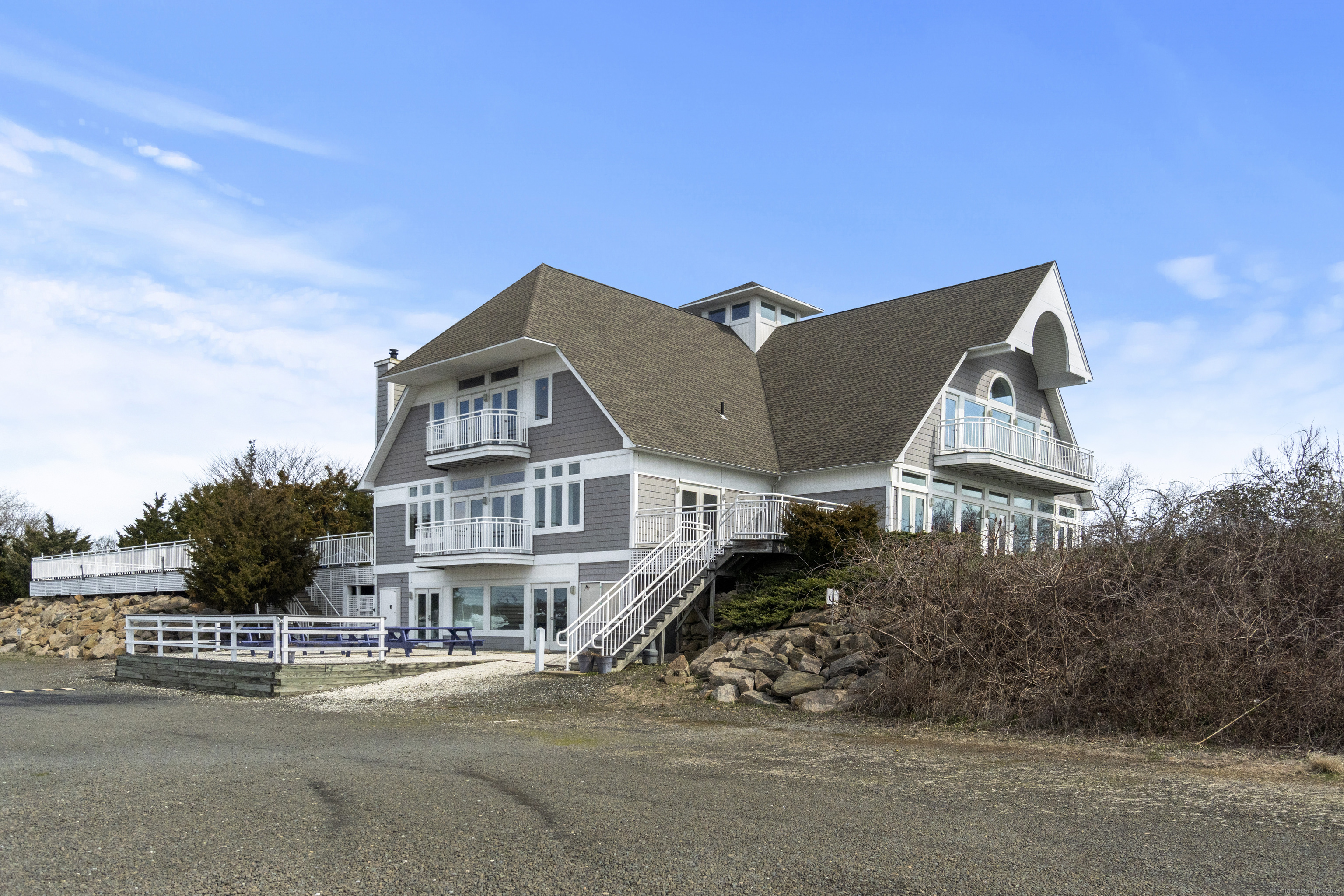 379 Whitfield Street, Unit CN946 Guilford, CT 06437 - Photo 5 of 7 a view of multiple houses with a street