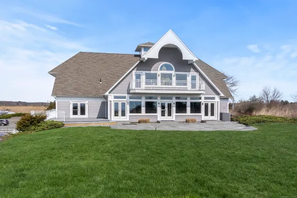 a front of a house with a garden