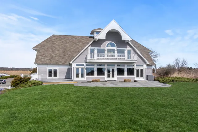 a front of a house with a garden
