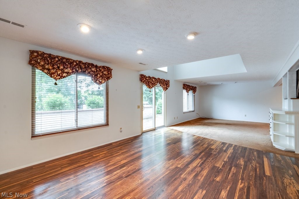3388 South Smith Road Fairlawn, OH 44333 - Photo 9 of 31 From Dining area to large Living/Family room areas with built ins and so much light. The expansive patio is ready for your summer time relaxation. Move right in. Professionally cleaned.