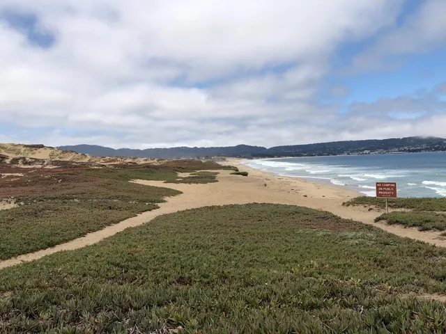 a view of a lake with beach and ocean view