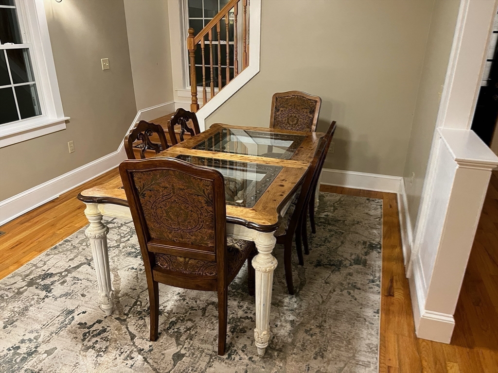 60 Edgehill Road Braintree, MA 02184 - Photo 17 of 30 a view of a chairs and table in the terrace