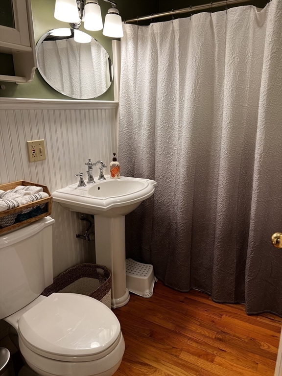 60 Edgehill Road Braintree, MA 02184 - Photo 20 of 30 a bathroom with a sink a mirror and a toilet