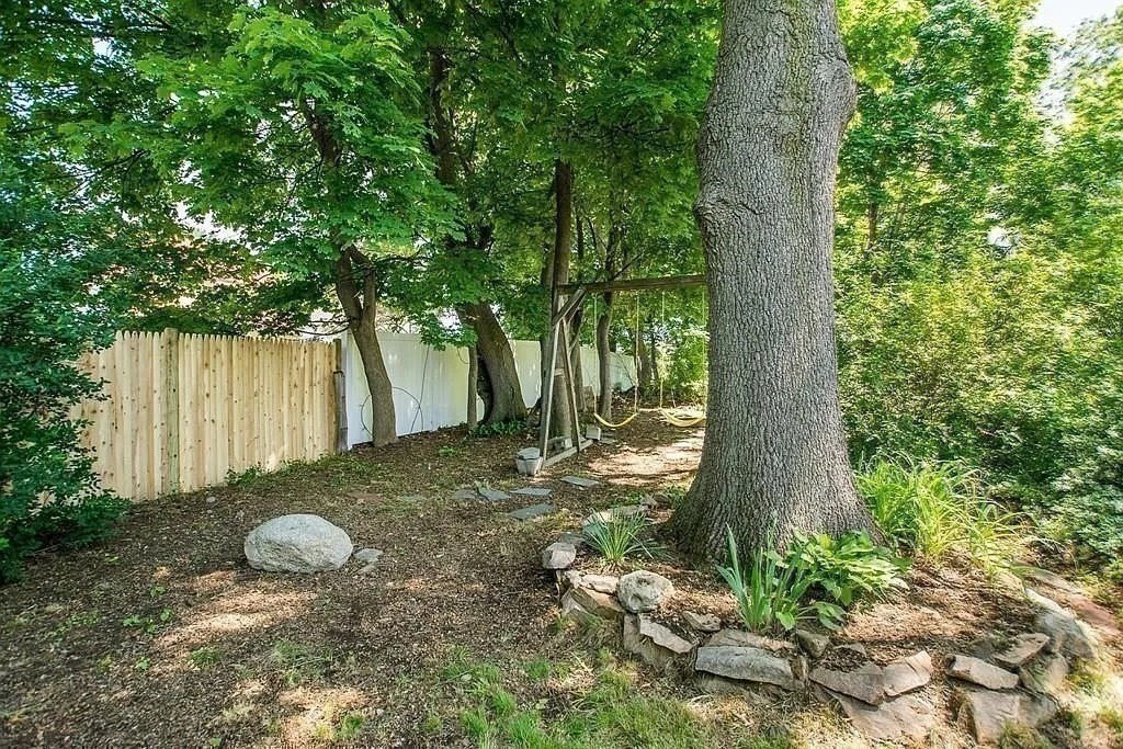 60 Edgehill Road Braintree, MA 02184 - Photo 25 of 30 a backyard of a house with lots of green space