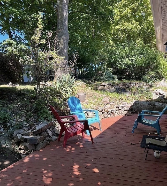 60 Edgehill Road Braintree, MA 02184 - Photo 26 of 30 a view of a yard with furniture