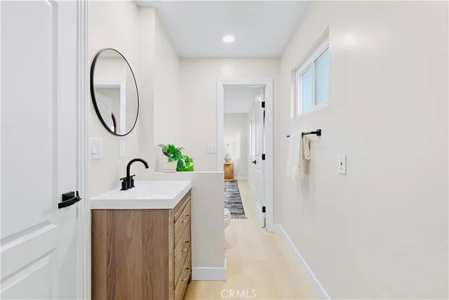 a view of a backyard with a garden and patio