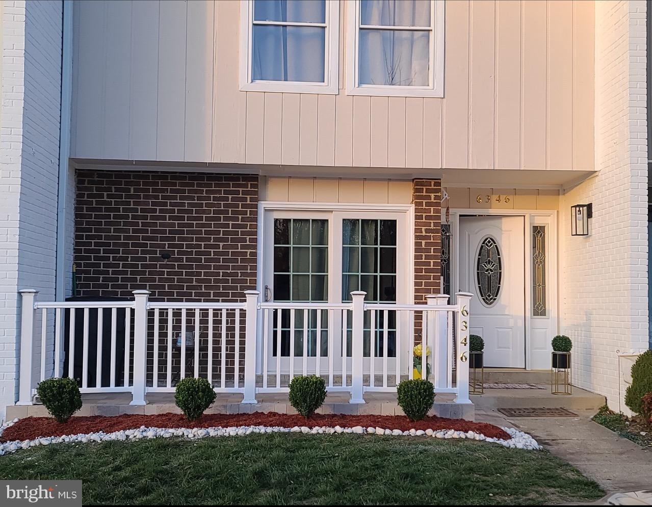 6346 Rockshire Street Alexandria, VA 22315 - Photo 2 of 10 a front view of a house with a yard