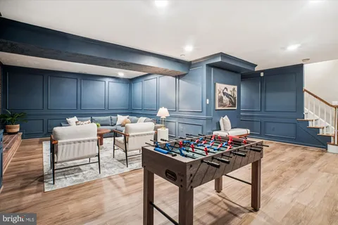 a kitchen with a table and chairs in it