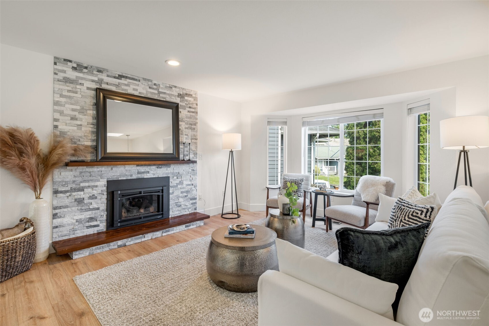 2 109th Place Southeast Everett, WA 98208 - Photo 2 of 40 a living room with furniture and a fireplace