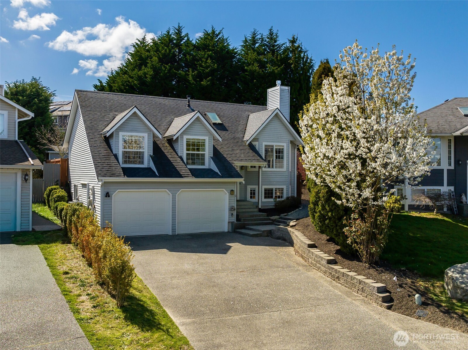 2 109th Place Southeast Everett, WA 98208 - Photo 35 of 40 a front view of a house with a garden