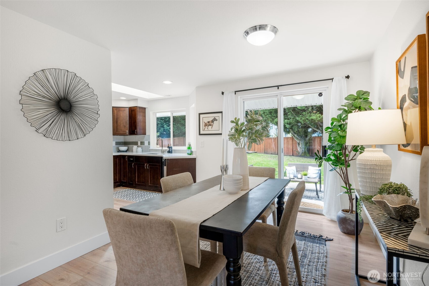 2 109th Place Southeast Everett, WA 98208 - Photo 4 of 40 a view of a dining room with furniture and a large window