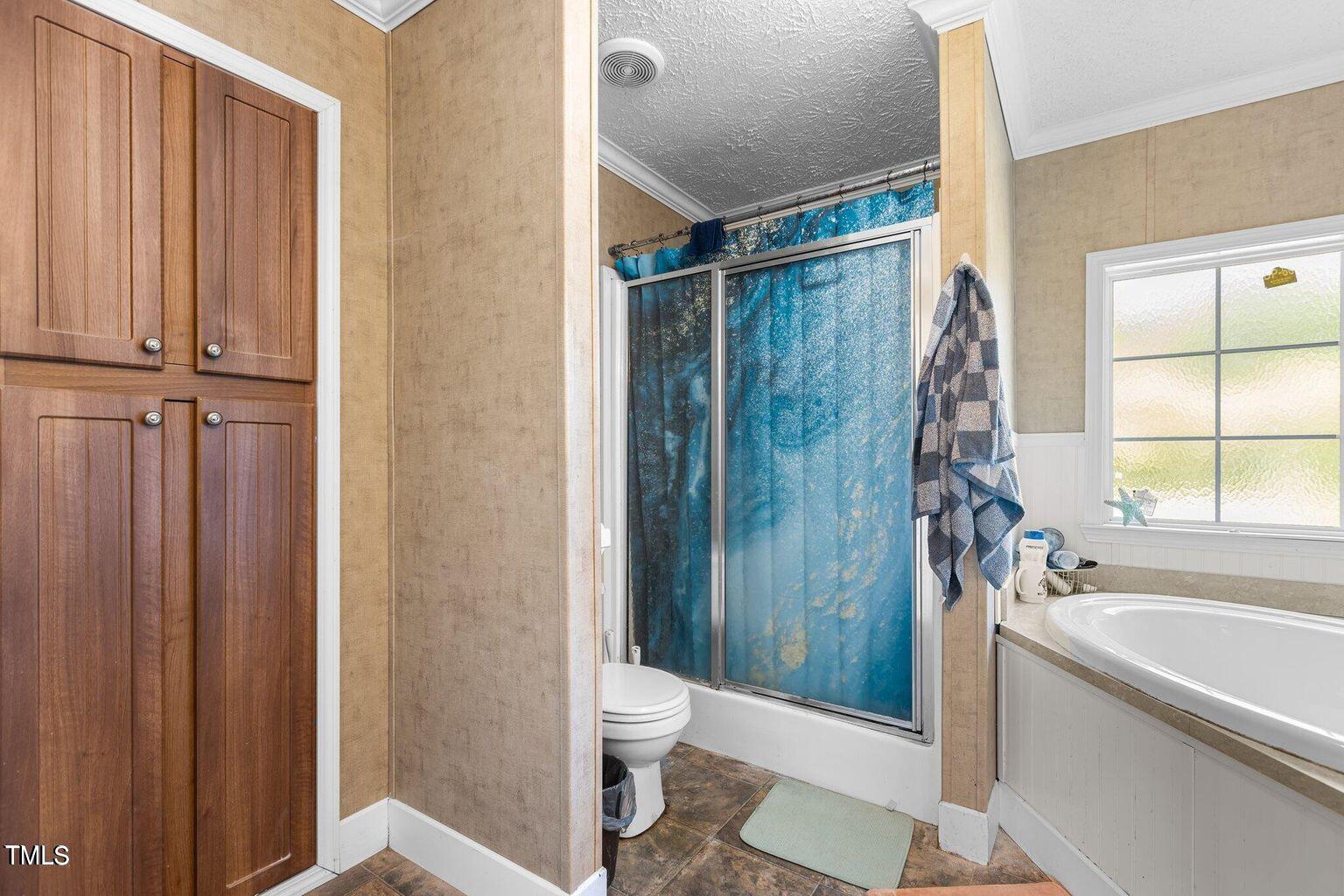 2751 Old Fairground Road Angier, NC 27501 - Photo 22 of 35 22 Primary Bath