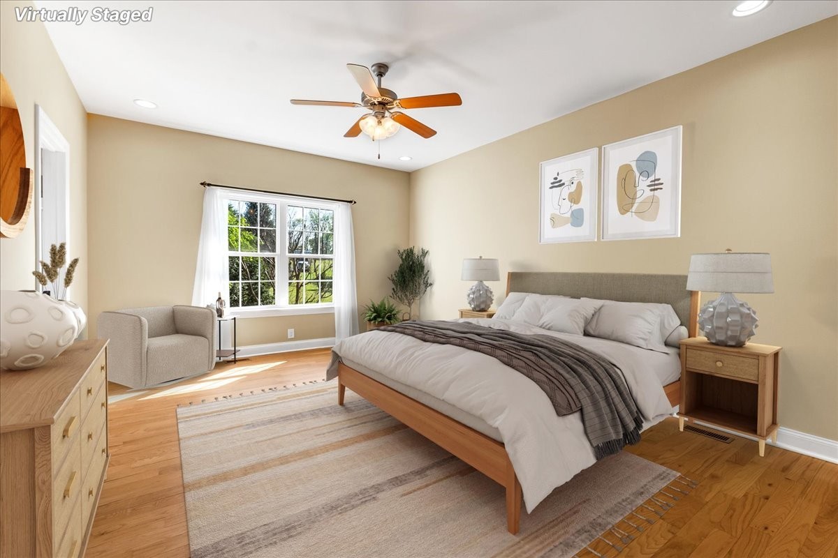 191 Mason Place Decherd, TN 37324 - Photo 32 of 53 a spacious bedroom with a large bed and a couch