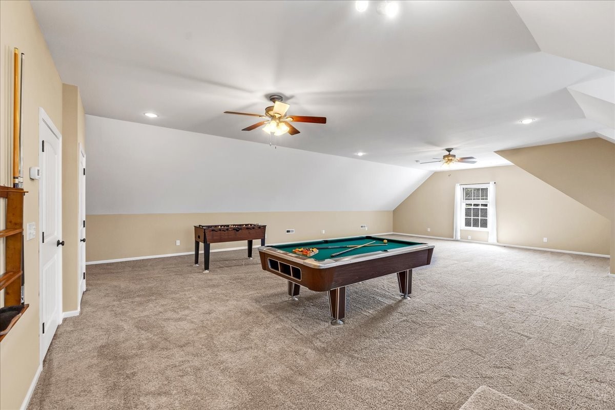 191 Mason Place Decherd, TN 37324 - Photo 40 of 53 an empty room with windows and ceiling fan