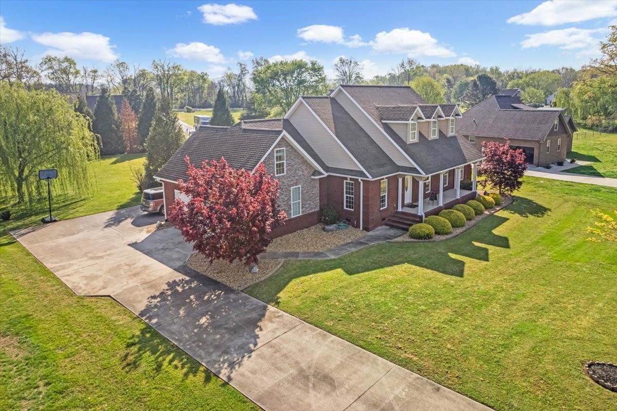 191 Mason Place Decherd, TN 37324 - Photo 5 of 53 a view of a house with a yard