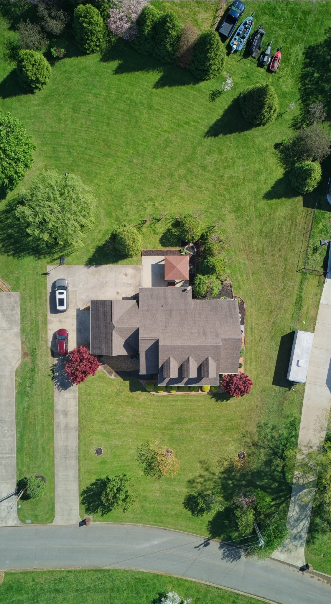 191 Mason Place Decherd, TN 37324 - Photo 52 of 53 an aerial view of residential houses with outdoor space and trees