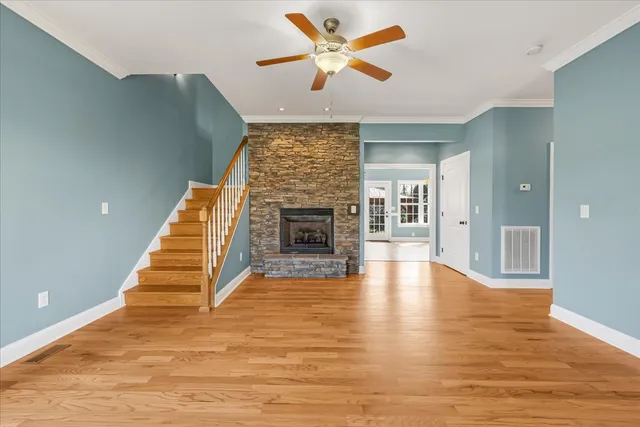 a view of an entryway with wooden floor