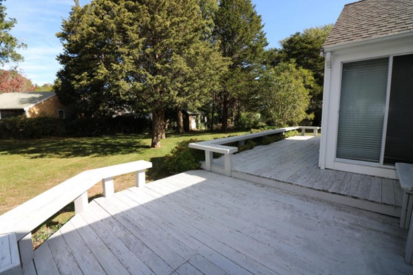 24 Mill Pond Road Orleans, MA 02653 - Photo 2 of 25 a view of a swimming pool with lounge chair