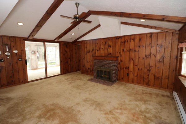 24 Mill Pond Road Orleans, MA 02653 - Photo 5 of 25 a view of an empty room with a window