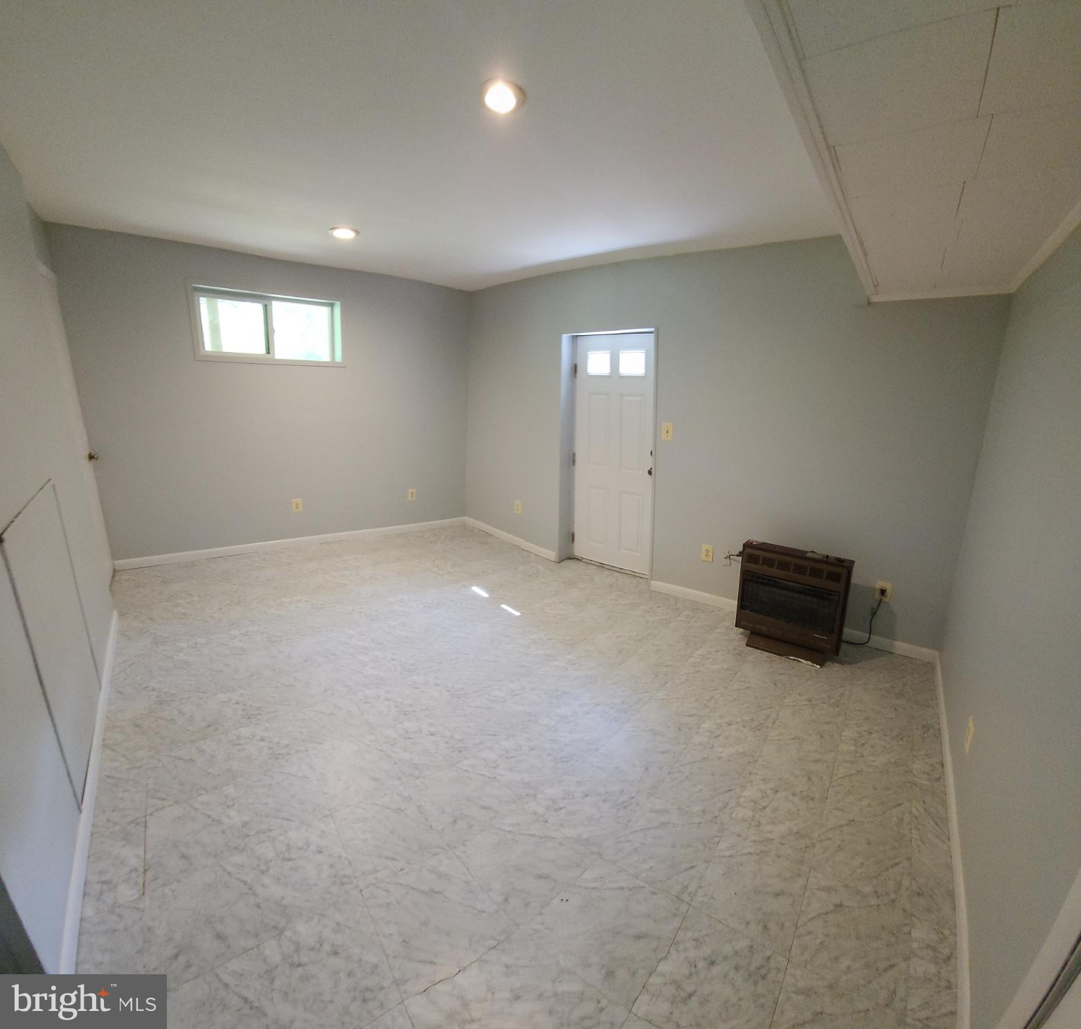 234 Hilltop Loop Road Harpers Ferry, WV 25425 - Photo 6 of 14 Rec room with propane heater