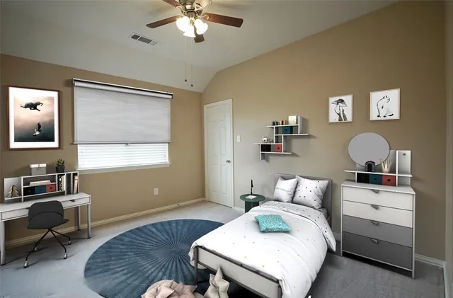 a bedroom with furniture and a window