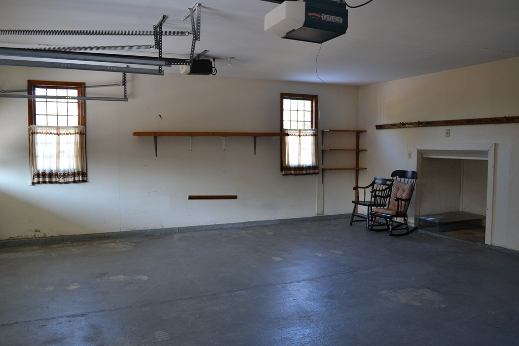 40 Joshua Jethro Road Harwich, MA 02645 - Photo 11 of 22 an empty room with windows and fireplace