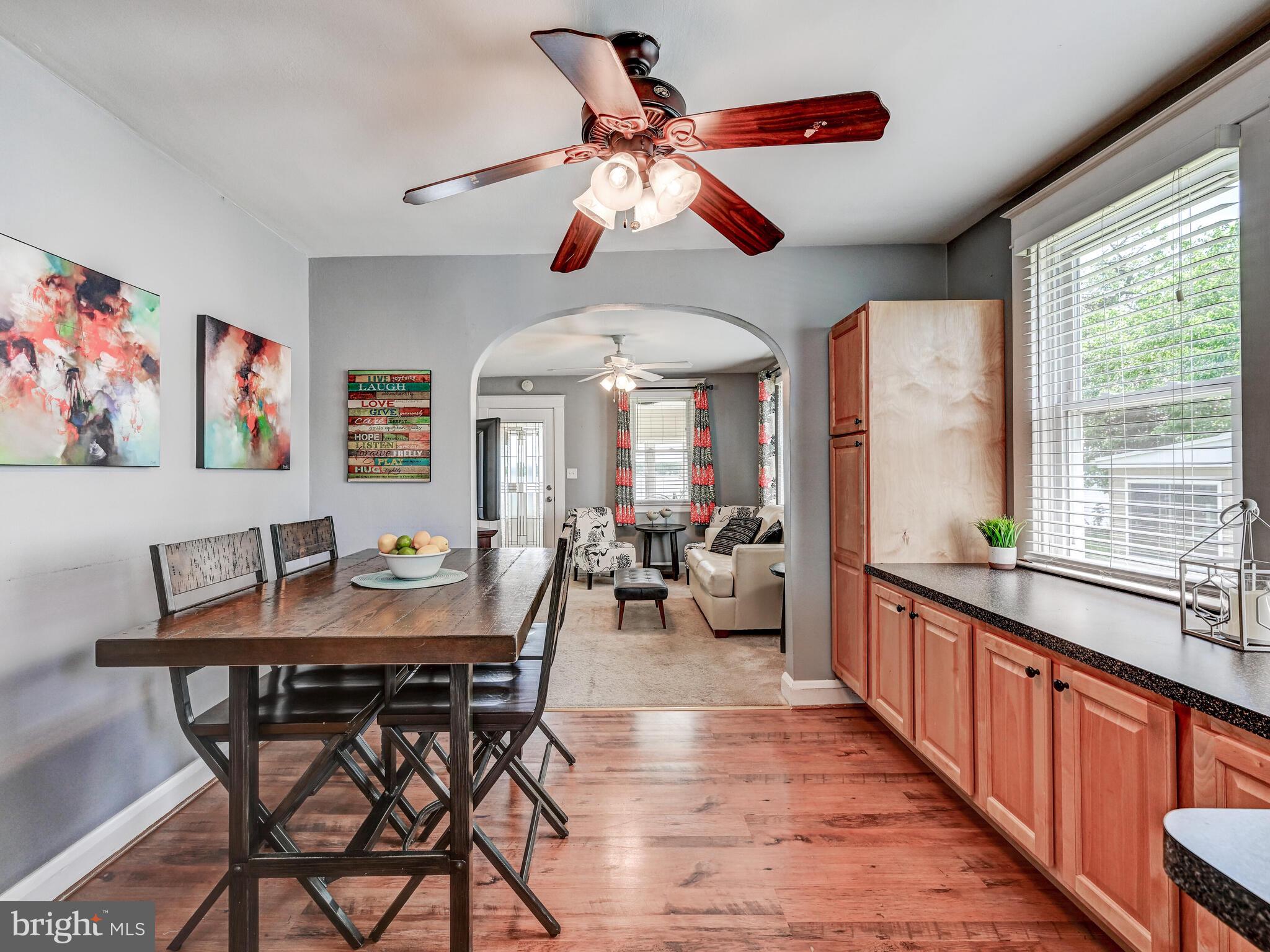 3932 Glenhurst Road Baltimore, MD 21222 - Photo 13 of 47 a view of a dining room with furniture window and outside view