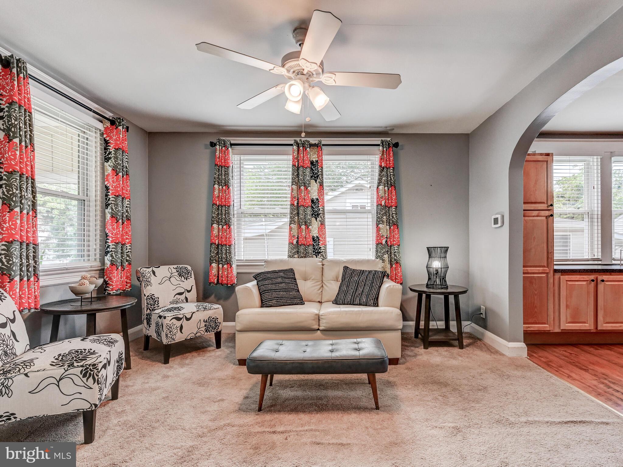 3932 Glenhurst Road Baltimore, MD 21222 - Photo 20 of 47 a living room with furniture and a large window