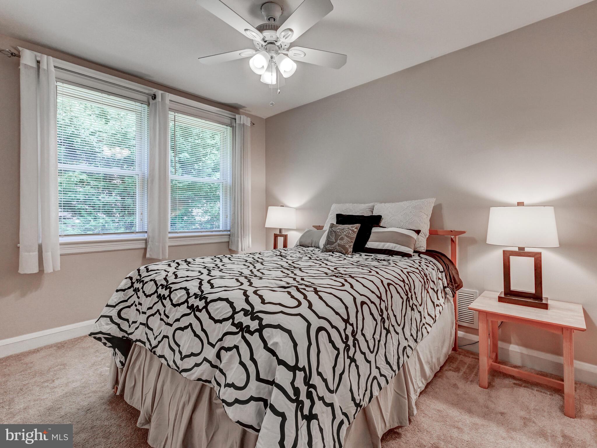 3932 Glenhurst Road Baltimore, MD 21222 - Photo 22 of 47 a bedroom with a bed and a window